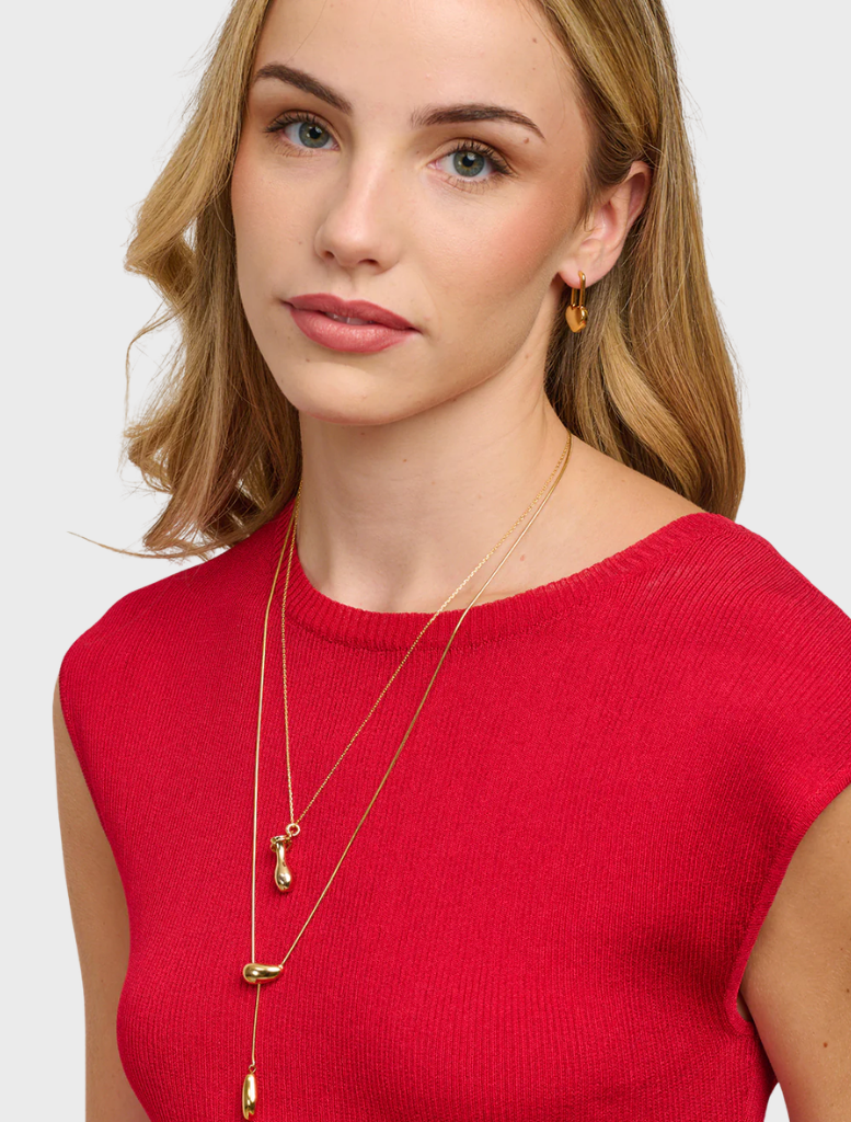 Gold Galina earrings showcasing a refined style, ideal for enhancing any outfit with a touch of sophistication.