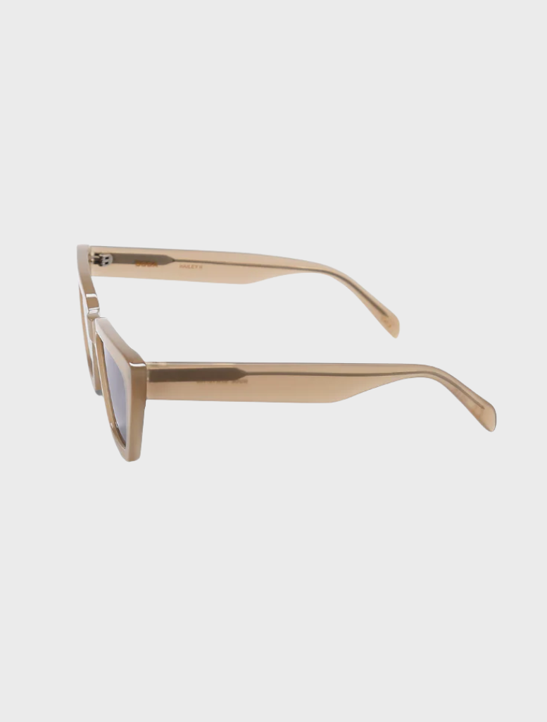 Hailey II sunglasses showcasing a nude frame paired with grey lenses, ideal for a fashionable appearance.