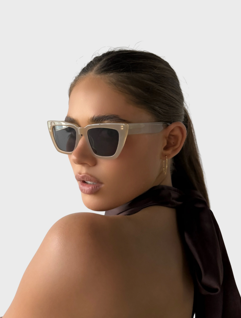 Hailey II sunglasses with a nude color frame and grey lenses, offering a chic and contemporary look.