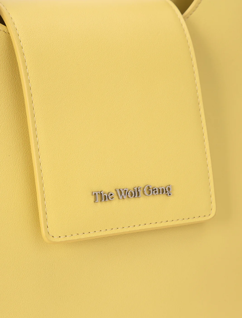 Inka Bag in a creamy Butter hue, combining fashion and functionality for everyday use and special events.