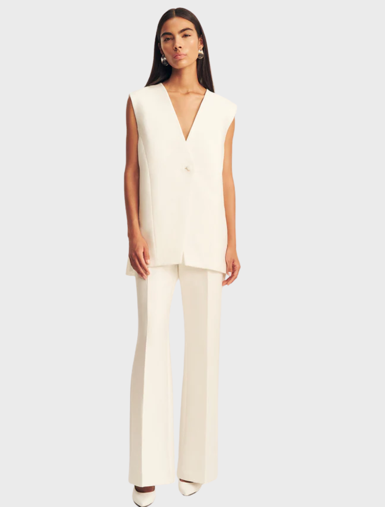 Otis sleeveless blazer in ivory, showcasing a chic and modern silhouette for versatile styling options.
