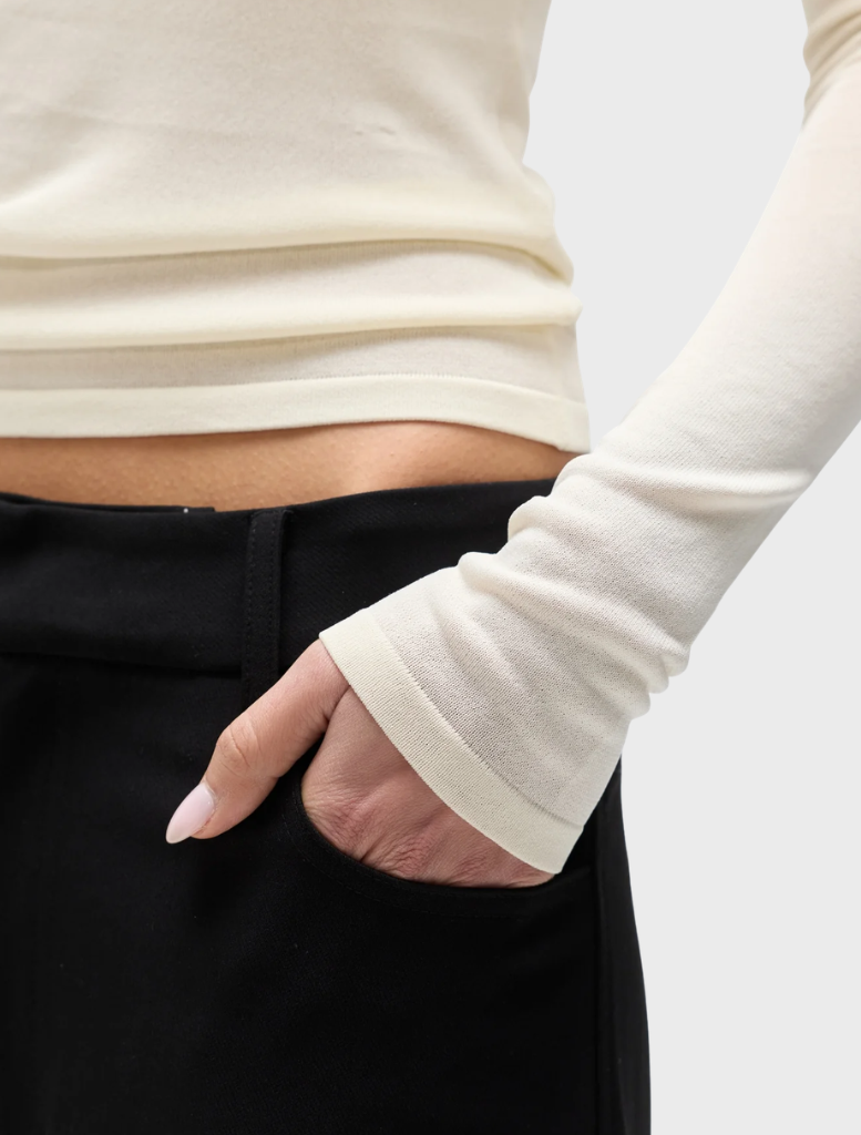 Elegant ivory top from Stevie, crafted with a chic design that complements a range of outfits and settings.