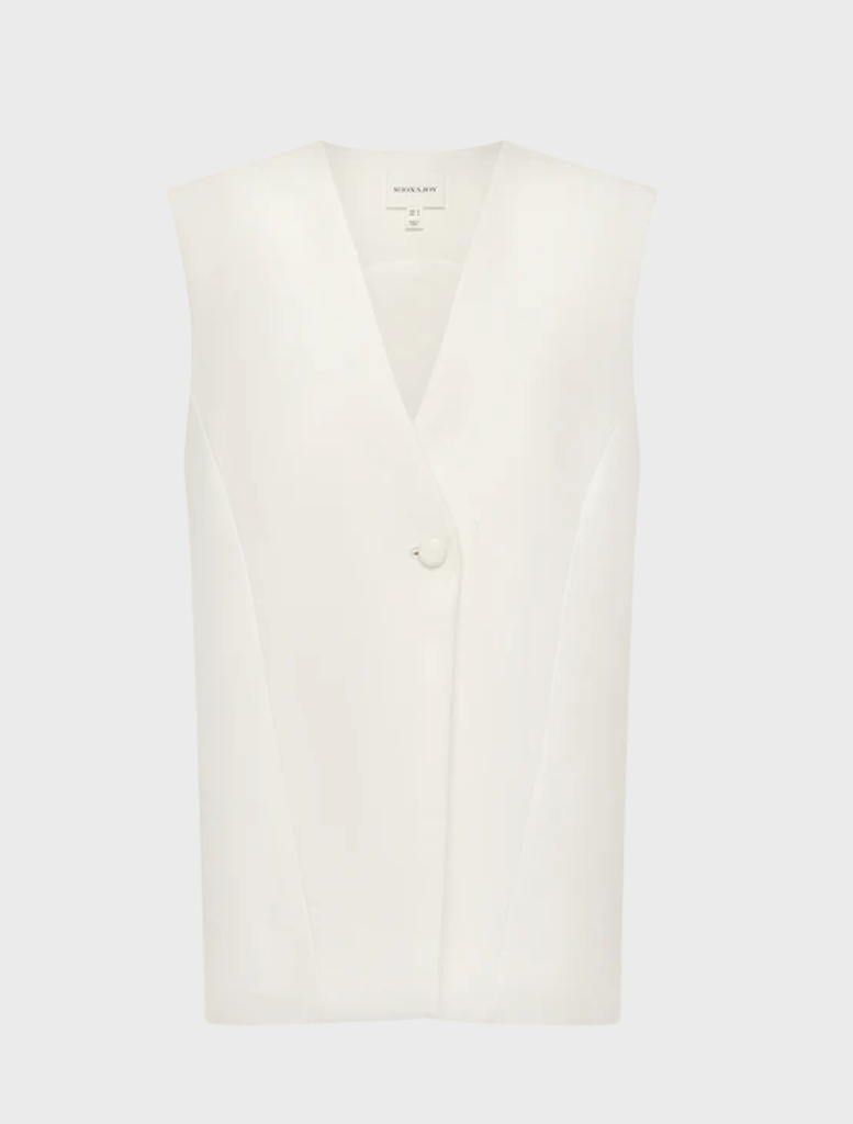 Ivory sleeveless blazer by Otis, featuring a tailored design suitable for formal or casual occasions.