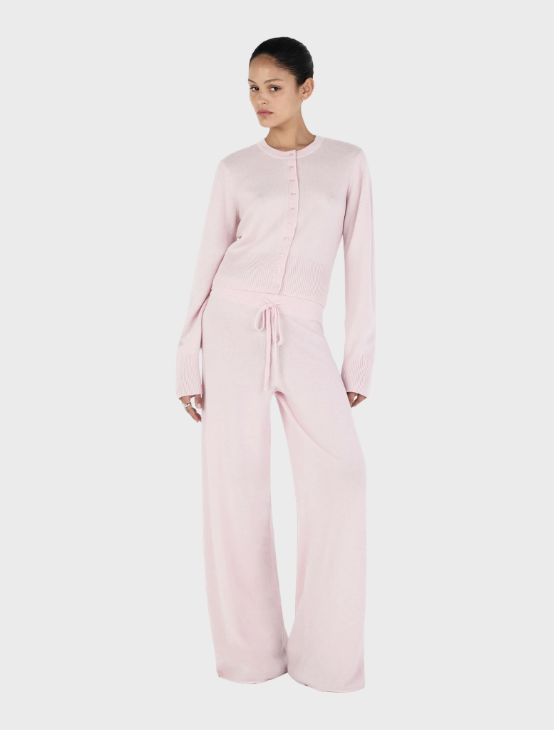 Soft blush Jada Cashmere Pant shown, highlighting its luxurious fabric and chic design for both casual and formal occasions.