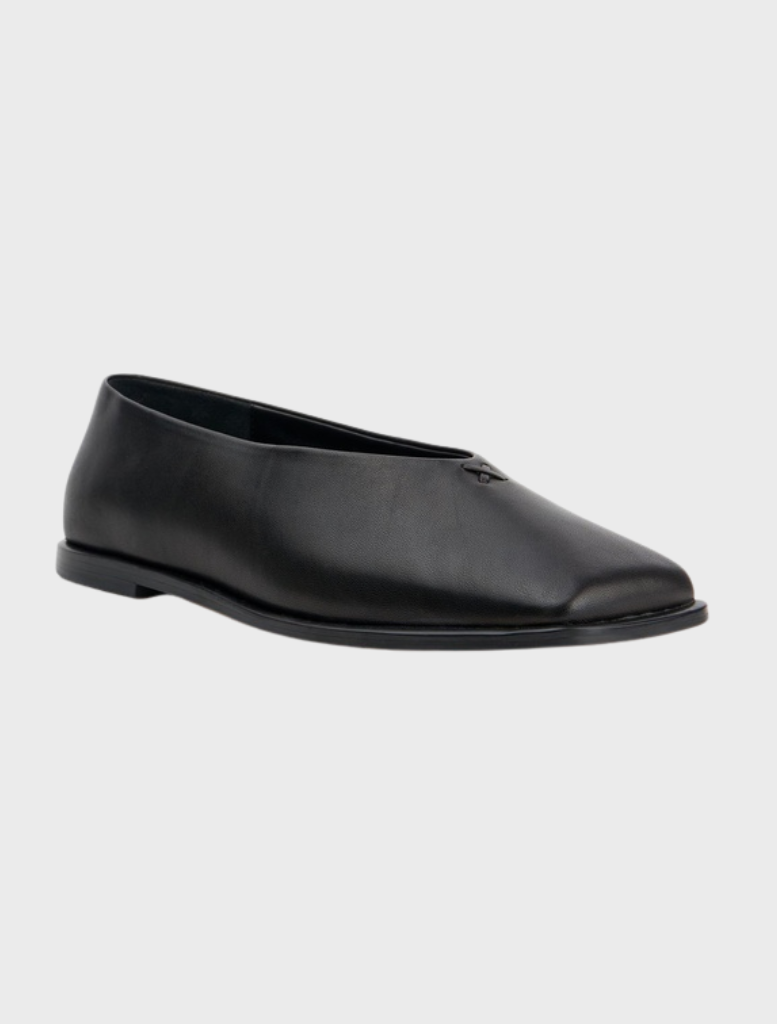 Elegant black jade ballet flats featuring a minimalist style suitable for various occasions.