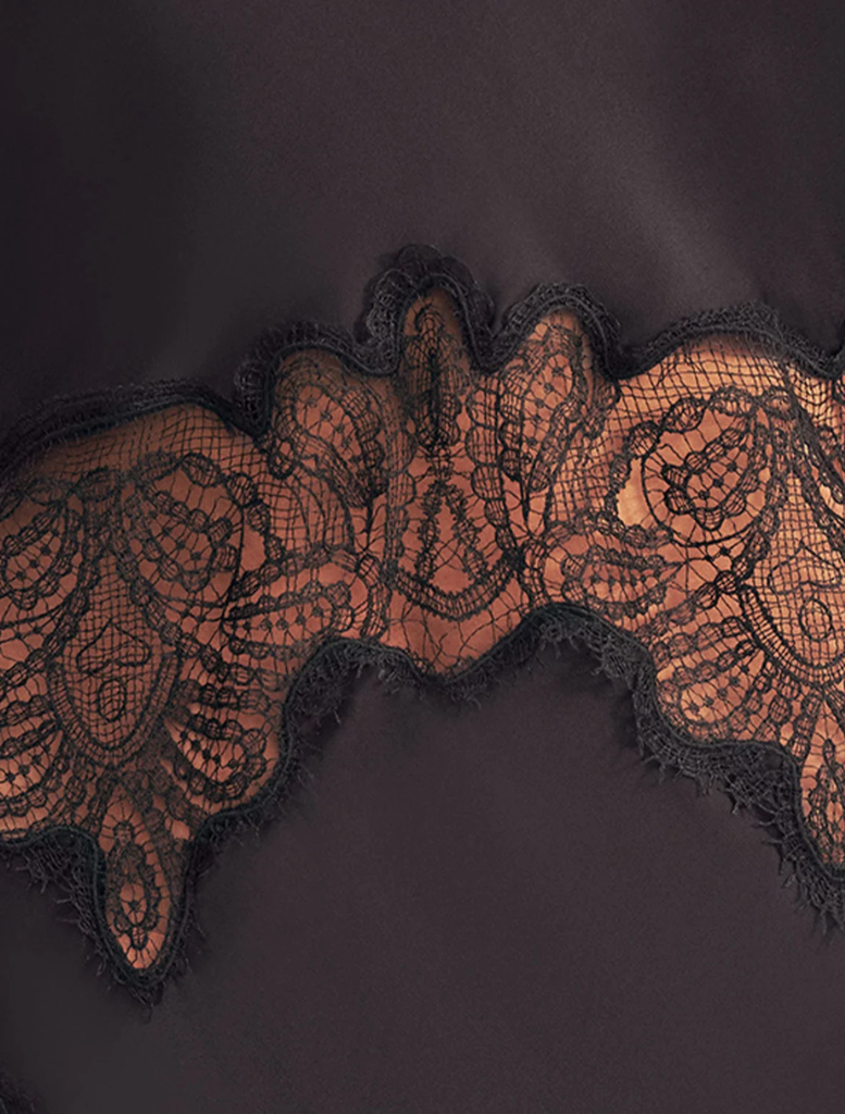 Elegant black maxi dress with a high lace neck, designed for a flattering fit and graceful movement.