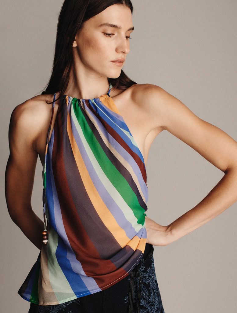 uniper Silk Top with a Wave Length motif, highlighting a smooth silk texture and dynamic wave design in rich hues.