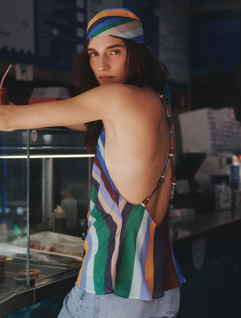 Juniper Silk Top in Wave Length design, featuring soft silk fabric with a flowing, wave-inspired pattern in vibrant colors.