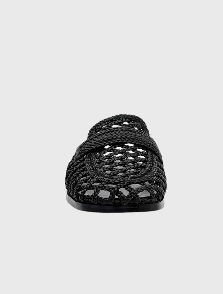 Krissy is a stylish black woven mule with a square toe, wide crossover strap, and open back for comfortable slip-on access.