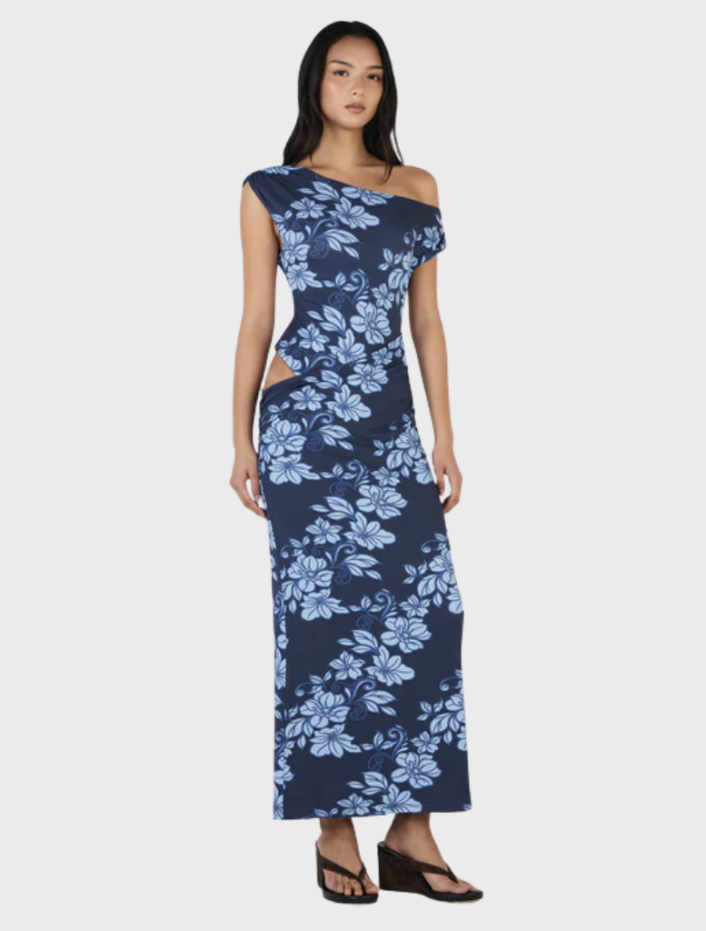 Navy maxi dress adorned with a rolling waves design, offering a chic and graceful appearance.