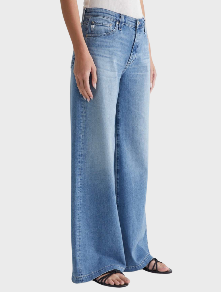 Leana Mid Rise Palazzo pants in Dune color, featuring a relaxed fit and elegant drape for a stylish look.