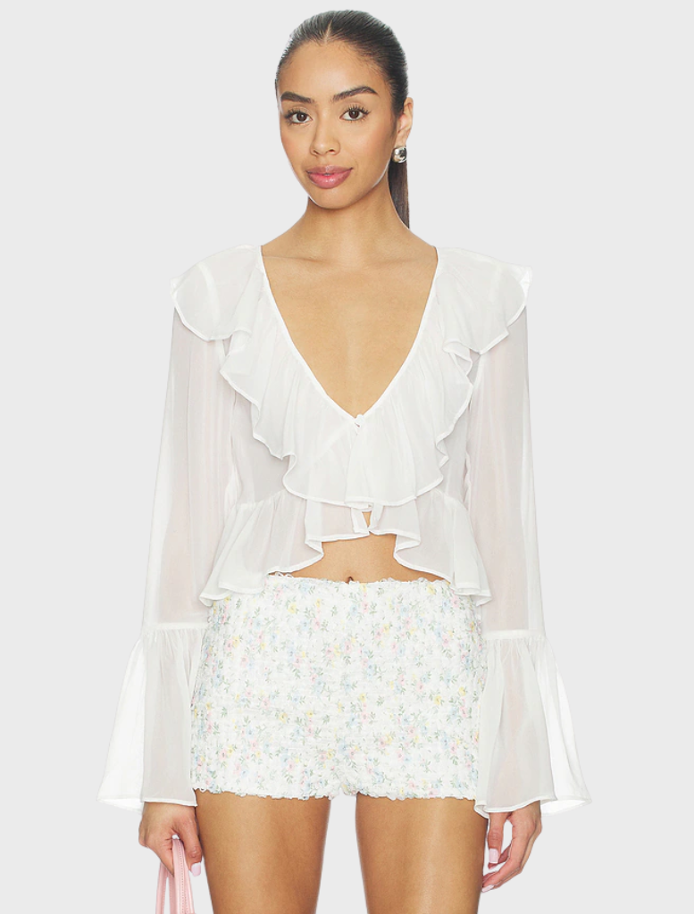 White Lila Flare Top featuring a stylish design, perfect for casual or dressy occasions.