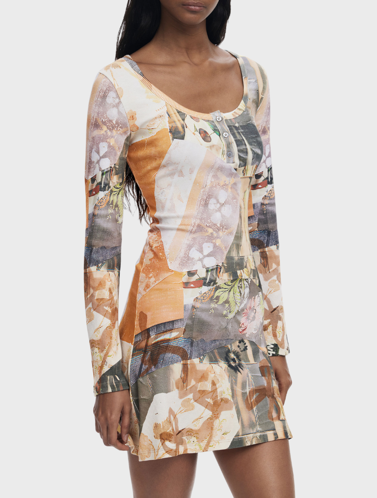 Dress with long sleeves in a multi-colored pattern, showcasing a stylish and vibrant design suitable for various occasions.