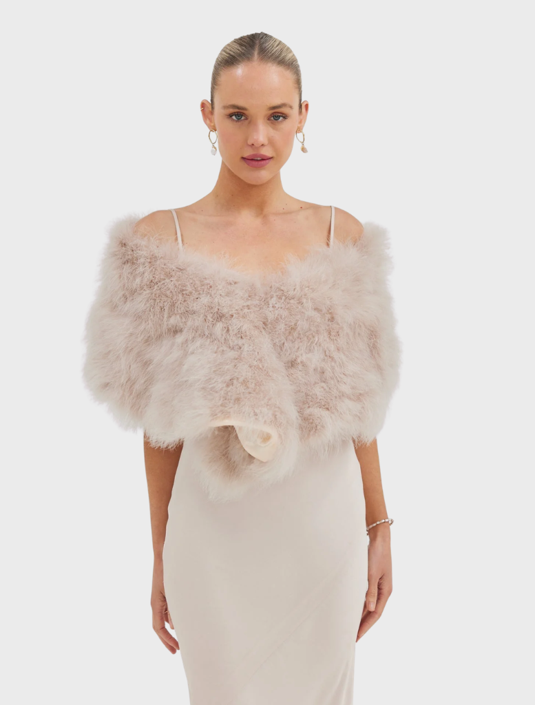 Lottie Wrap in blush, made from upcycled Marabou Feather, features a double hook-and-eye closure and satin lining.