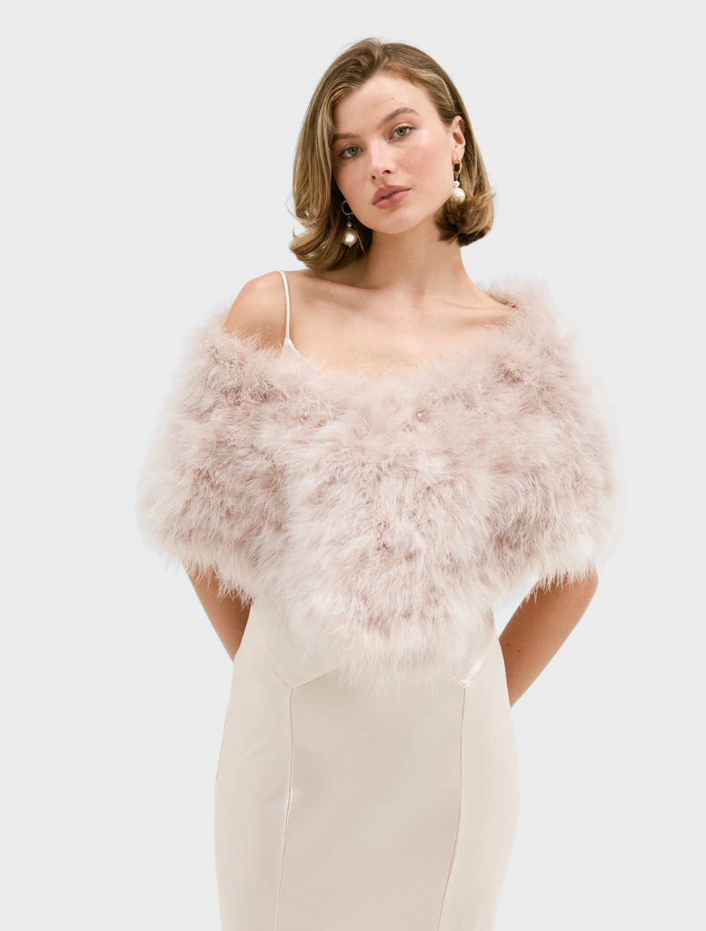 Lottie Wrap in blush, made from upcycled Marabou Feather, features a double hook-and-eye closure and satin lining.