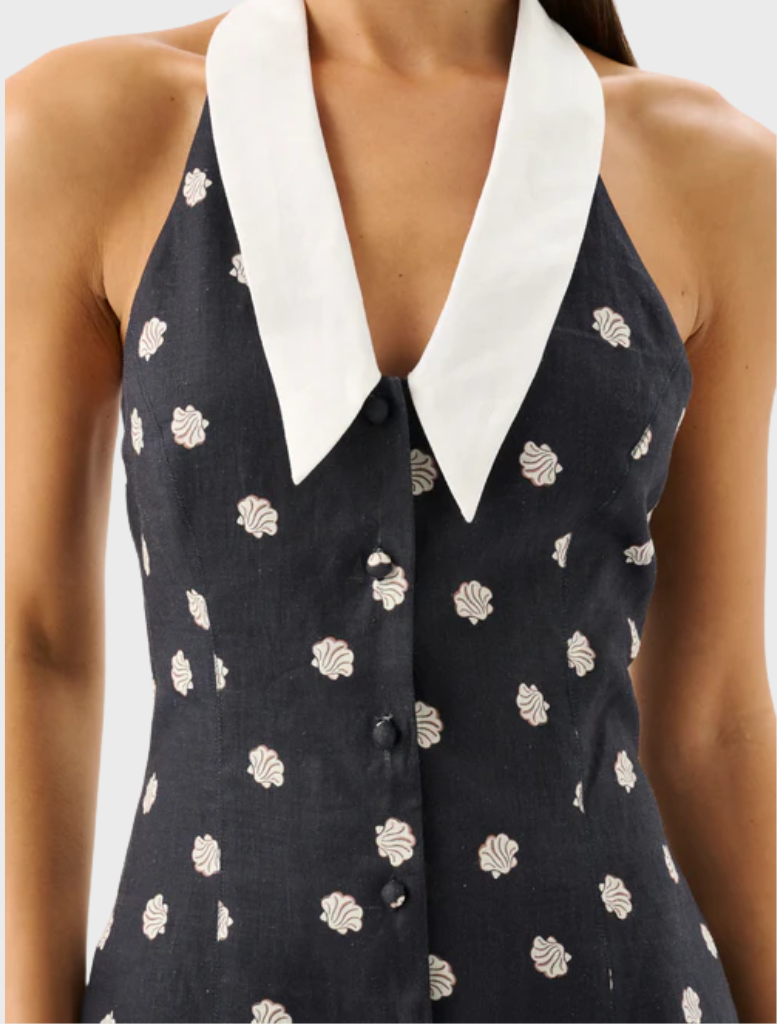 The Lucille Mini Dress from Riviera offers a fashionable, fitted style in lively colors, ideal for casual or semi-formal events.