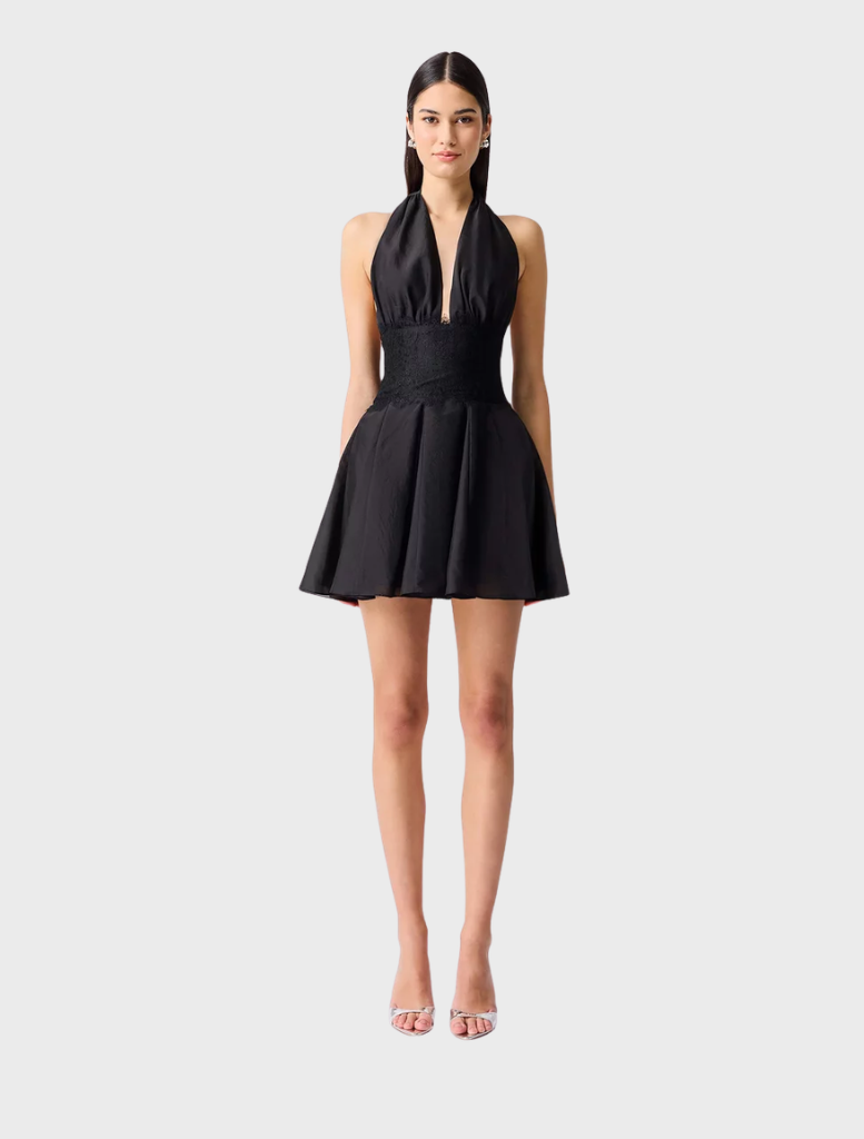 Black Lucinda Halter Mini Dress featuring a fitted silhouette and halter neckline, perfect for stylish summer outings.