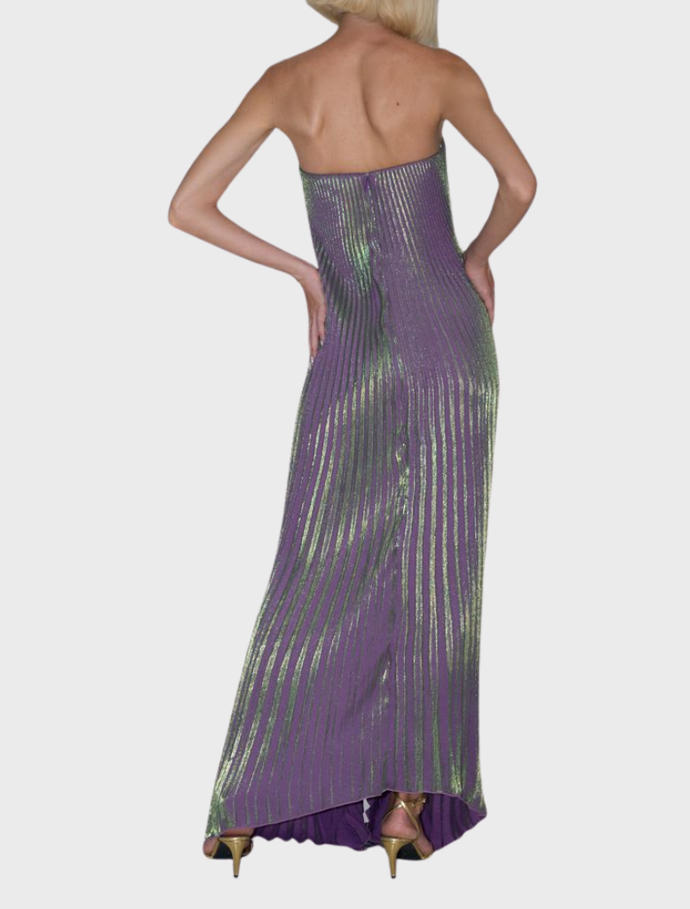 Classic black tie gown featuring a strapless neckline and V detail, designed for graceful movement at formal events.