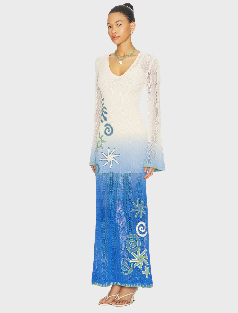 Stylish Marine Malaga Maxi Dress showcasing a long, flowing cut, perfect for summer gatherings and beach outings.