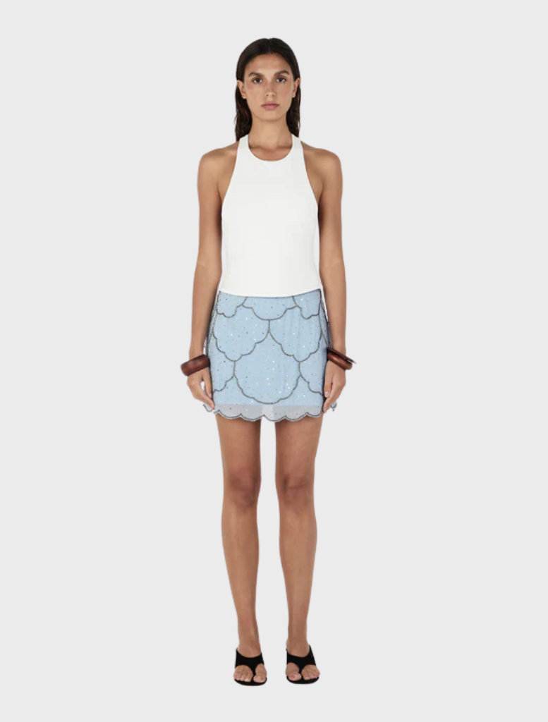 Cornflower blue Marais beaded mini skirt with intricate beadwork, showcasing a stylish and vibrant design.