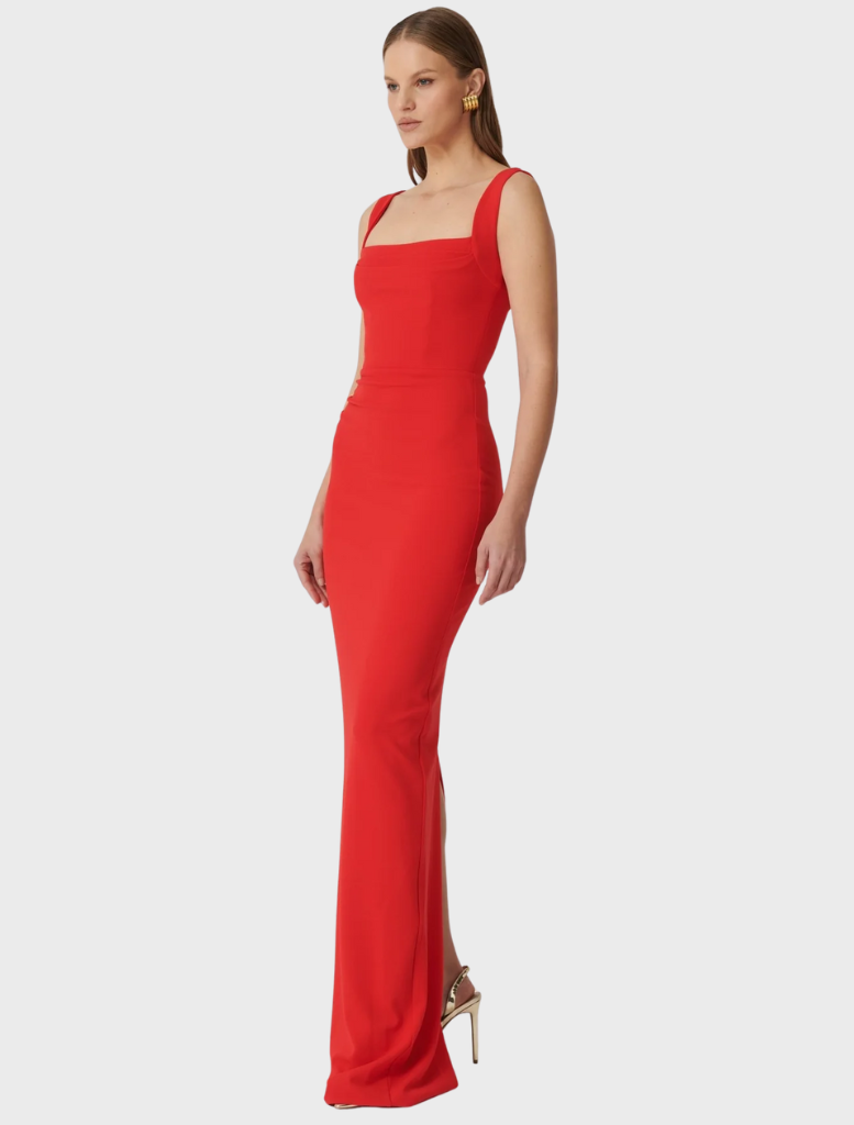 Strapless Marbella gown in cherry red with a long silhouette and square neckline.