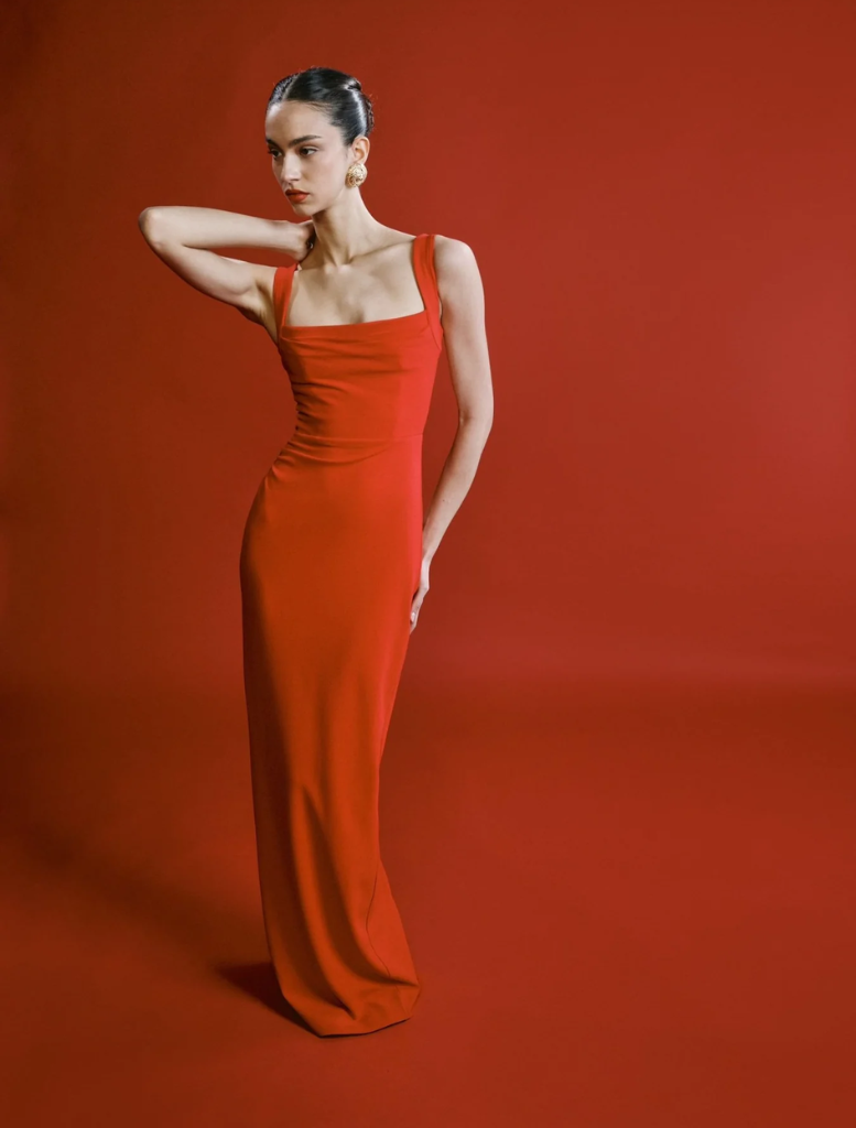 Long, strapless cherry red Marbella gown featuring a square neckline.