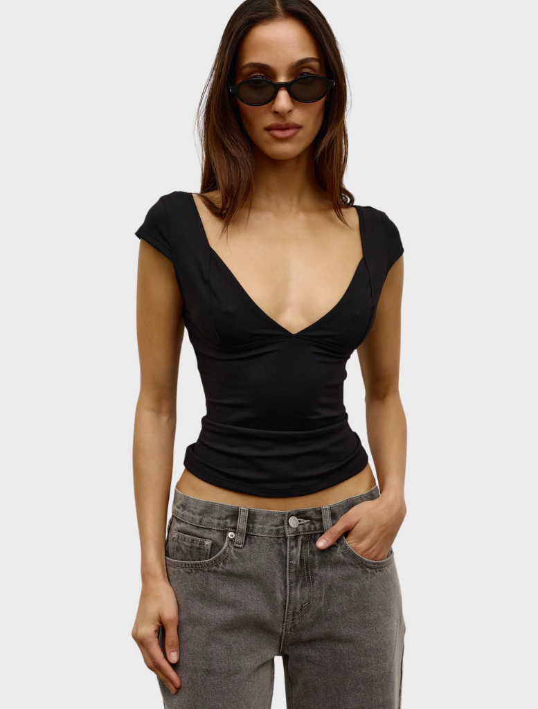 Black Marianna top featuring a sleek design, perfect for casual or formal occasions.