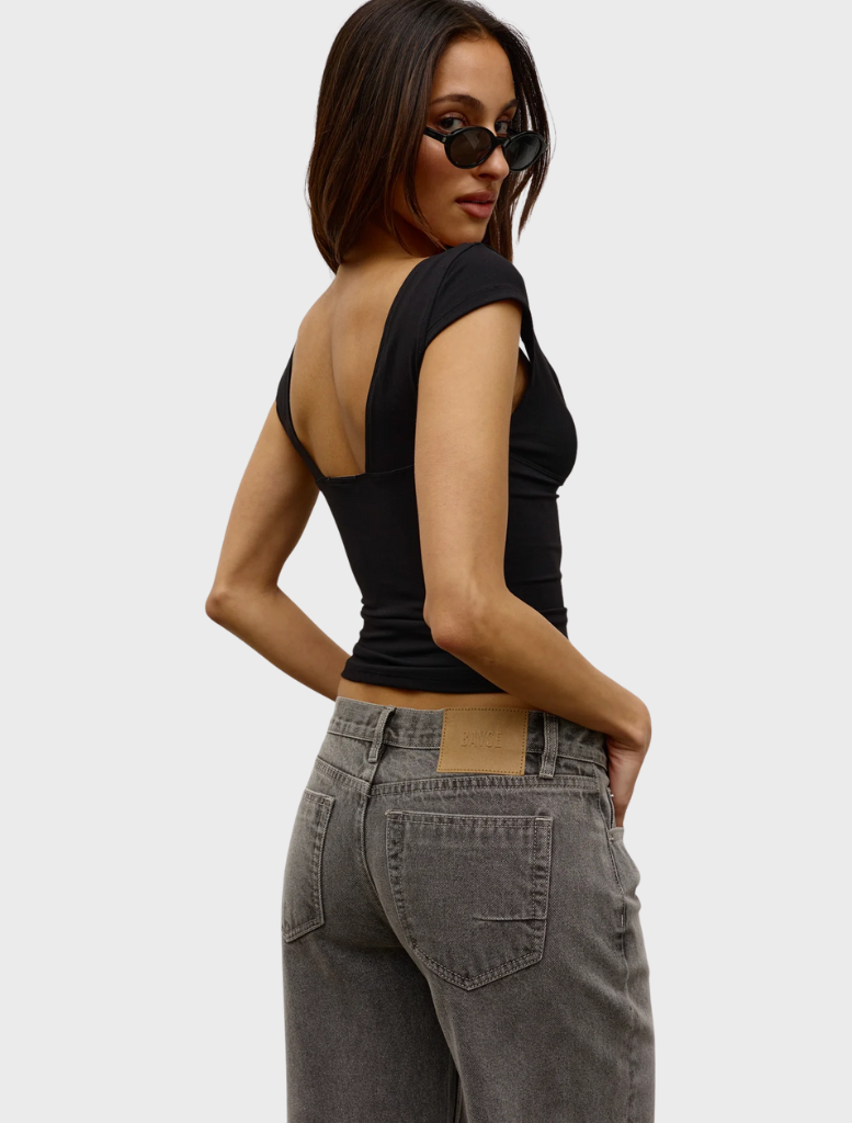 Chic black Marianna top designed for versatility, complementing any wardrobe effortlessly.