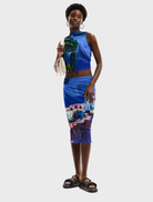 Fal Sky Lacorix presents a medieval blue skirt, showcasing elegant draping and a timeless silhouette.