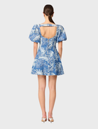 A blue and ivory A-line mini dress, featuring a stylish design suitable for casual or semi-formal occasions.
