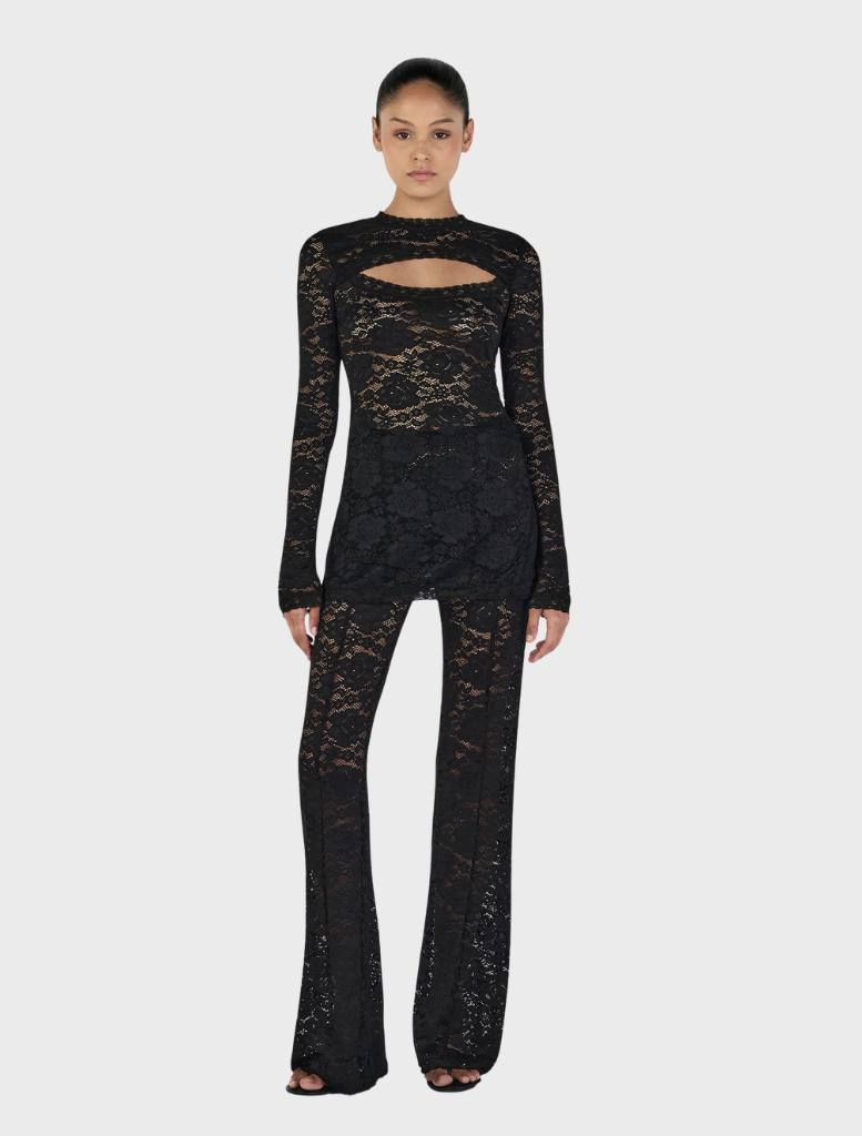 Misha Long Sleeve Top in black, featuring a sleek design suitable for casual or formal occasions.