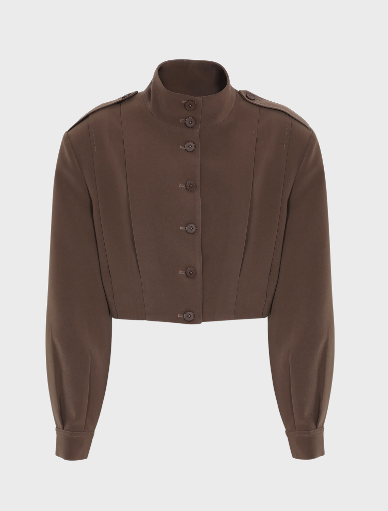 Mocha Vault Bomber jacket featured on a hanger, highlighting its modern style and rich color.