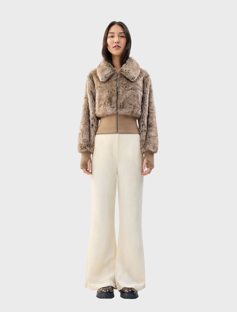 Event Horizon Jacket in natural color, featuring a sleek design suitable for outdoor activities and casual wear.