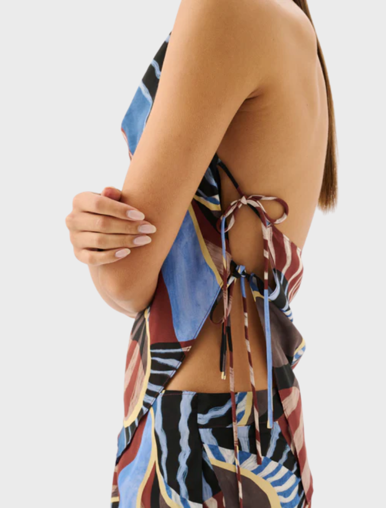 Nautica's Agave halter top showcases a trendy design with bright colors, ideal for warm weather outings.