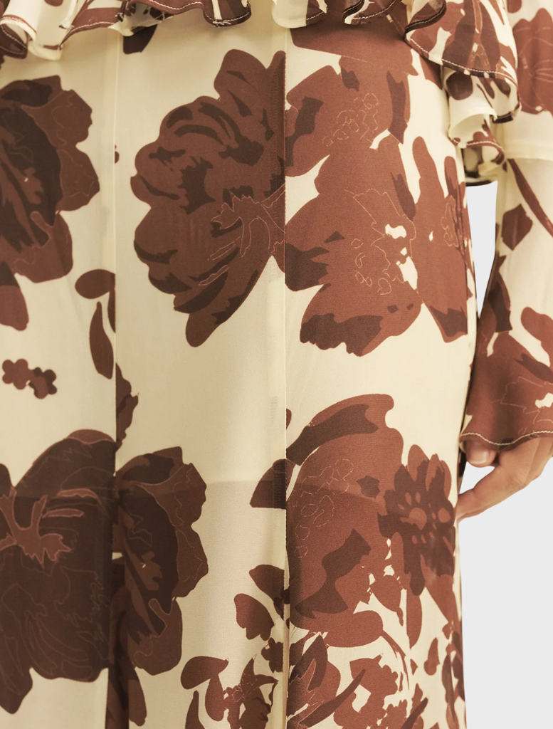 Noa Panelled Maxi Skirt featuring a Pineapple Wallflower print, showcasing vibrant colors and a flowing design.