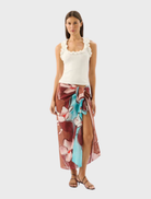 Ivory Paloma Tank top displayed on a hanger, featuring a simple and elegant design suitable for casual wear.