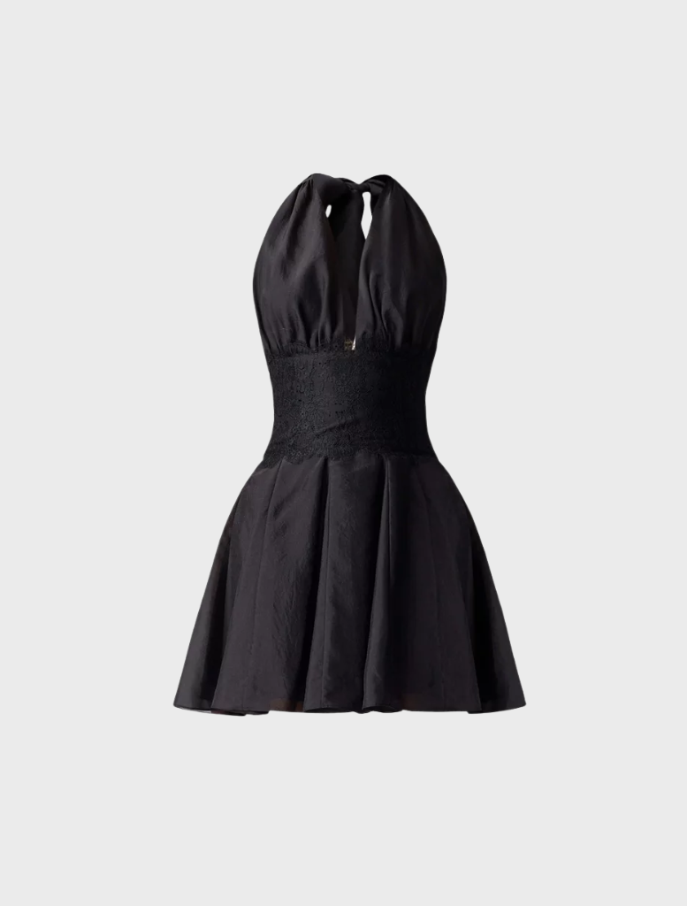 Chic black halter mini dress by Lucinda, designed with a sleek fit, suitable for various events and summer gatherings.