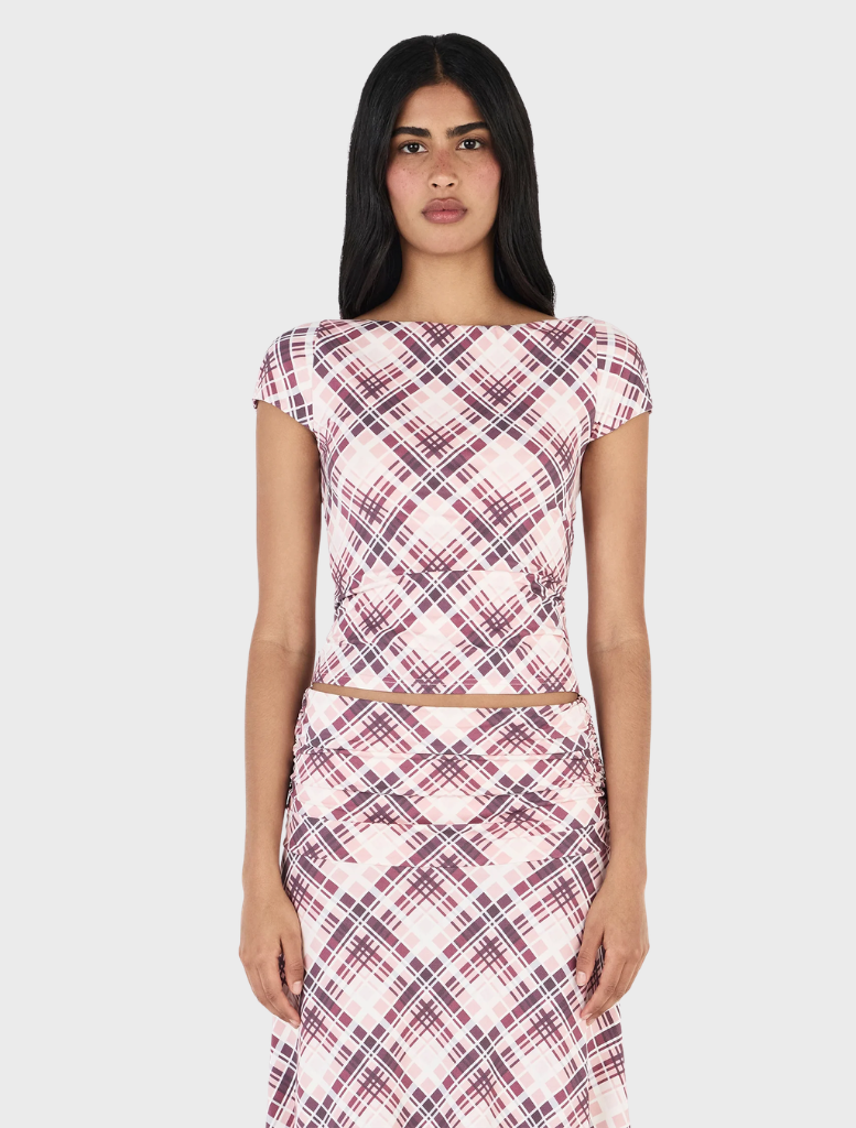 Berry plaid Paula Tee showcasing a vibrant mix of pink and green hues, perfect for a trendy, casual outfit.