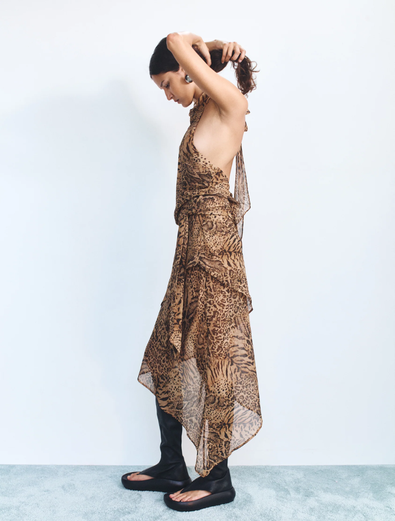 The Phaedra Skirt from Sirocco is crafted from eye-catching leopard print fabric.