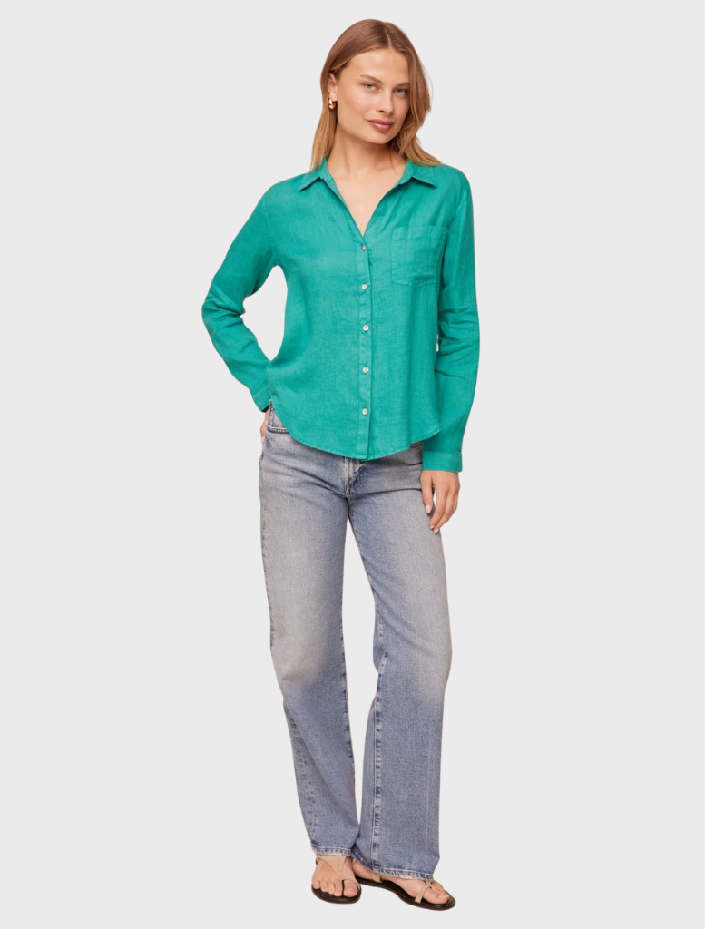 Aqua green pocket button-down shirt displayed on a hanger, showcasing its casual style and vibrant color.