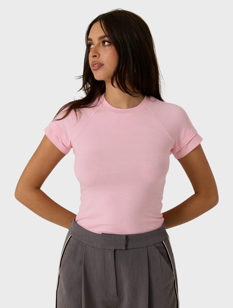 Pop pink Zarah Baby Tee, showcasing a comfortable fit and trendy style, perfect for casual outfits.