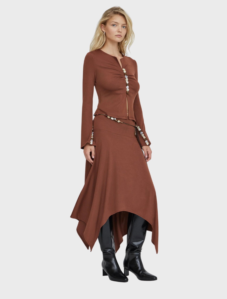 A stylish espresso-colored blouse made from lightweight fabric, featuring a modern design and elegant silhouette.