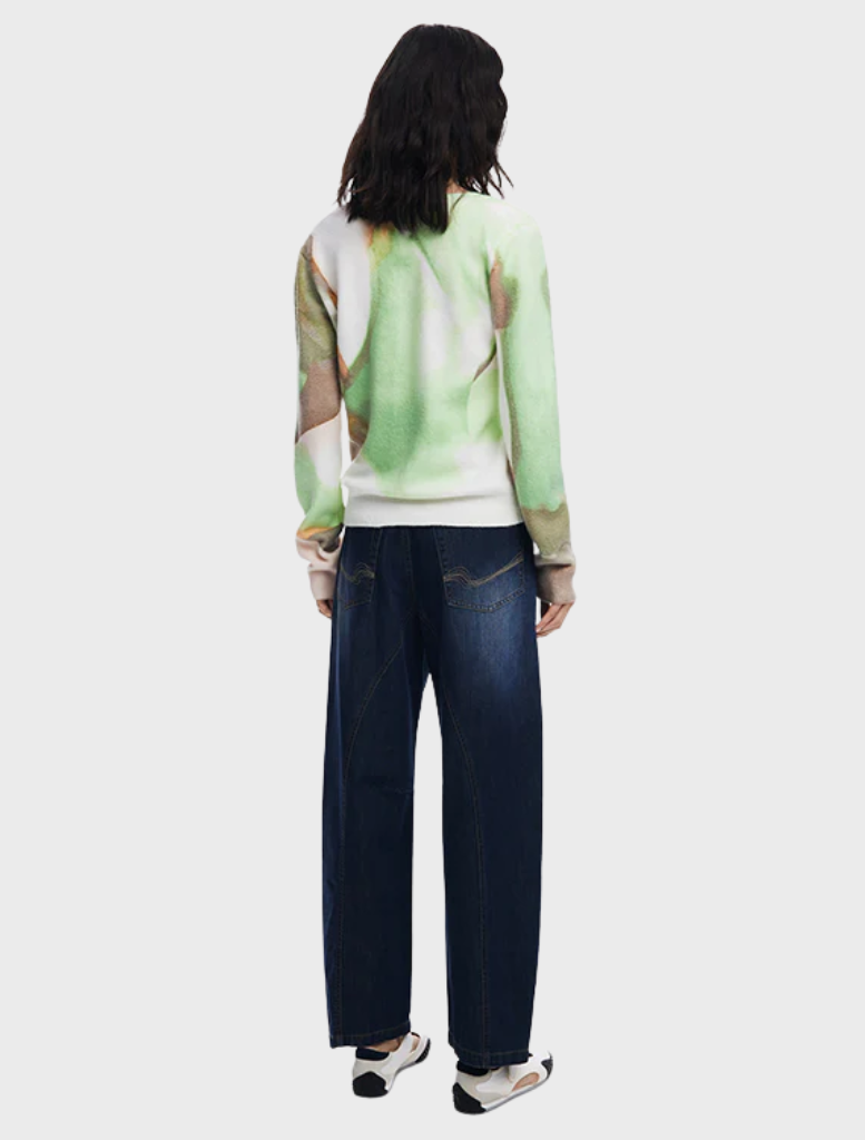 Thin gauge pullover adorned with an abstract art print, offering a stylish and modern look.