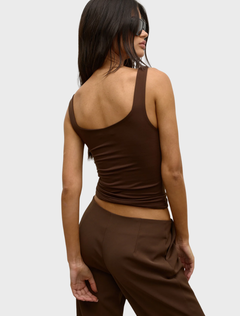 A chocolate Ray Tank, elegantly designed to serve as a decorative piece in contemporary living spaces.