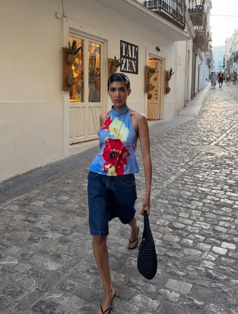 Top featuring vibrant floral designs.