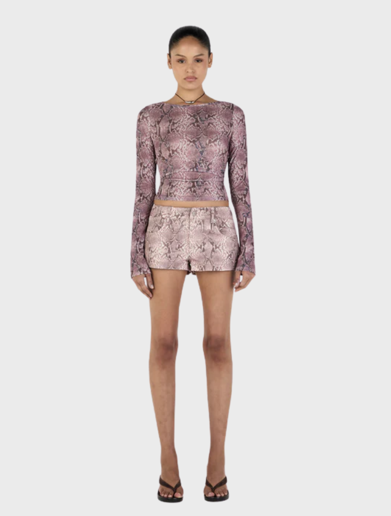 Mauve long sleeve top adorned with a snake print, combining comfort and style for any wardrobe.