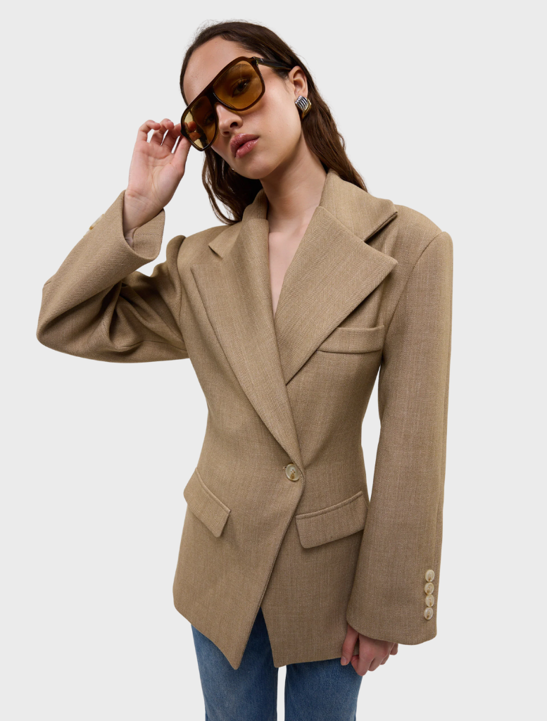 Elegant caramel Saskia cinched blazer showcasing a modern silhouette, suitable for business or formal occasions.