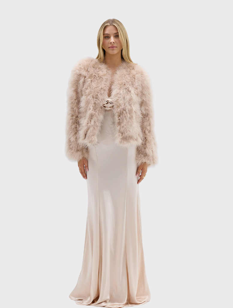 Cream-colored Scarlett Jacket, waist-length, handmade, featuring a flattering fit and optional hook/eye closure.