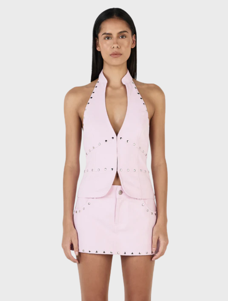 Baby pink Selma top with studded accents, combining elegance and modern fashion.