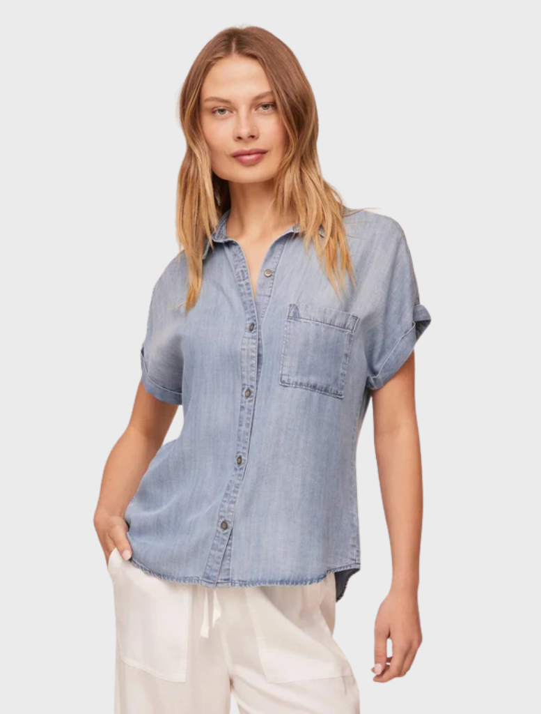 Short sleeve button-down shirt in a worn blue wash with a chest pocket.